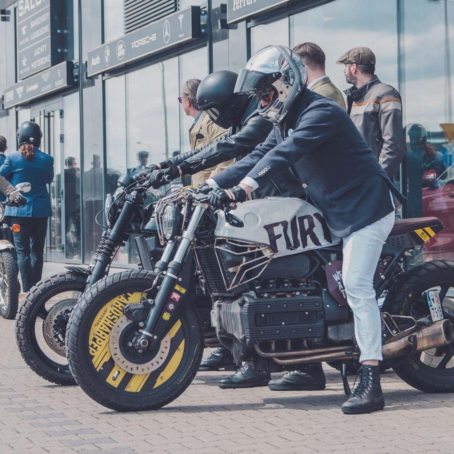 A custom motorcycle in FURY livery with a yellow number board